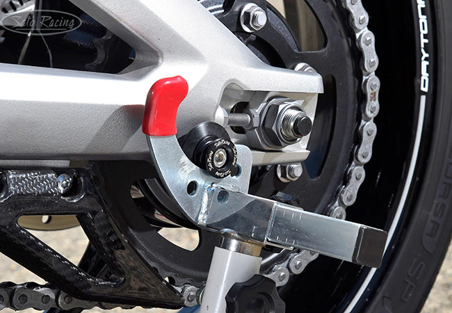 SATO RACING type 2 aluminum Swingarm Spools with Delrin backing rings on a Triumph Daytona 765