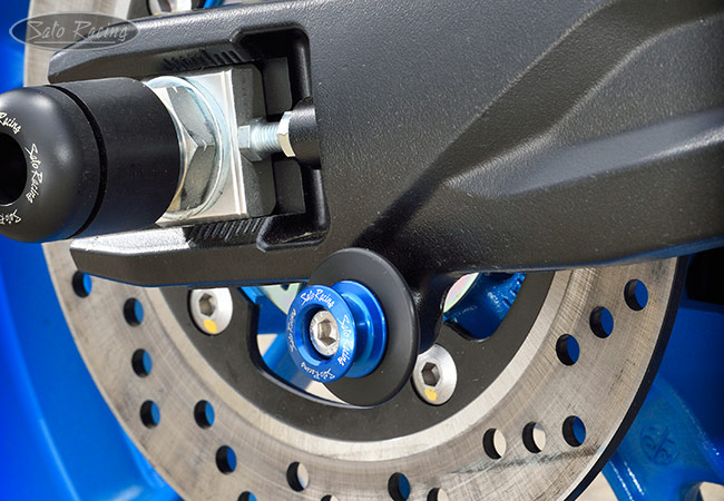 SATO RACING type 2 aluminum Swingarm Spools with Delrin backing rings on a Suzuki GSX-8S