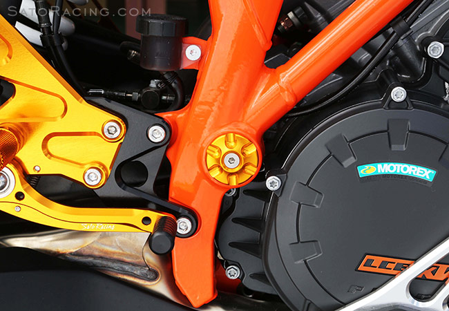 SATO RACING Lower Frame Plug in GOLD on a KTM 1290 Super Duke R