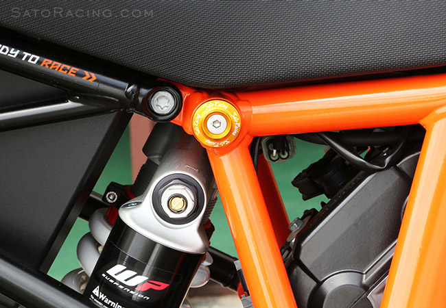 SATO RACING Upper Frame Plug in GOLD on a KTM 1290 Super Duke R