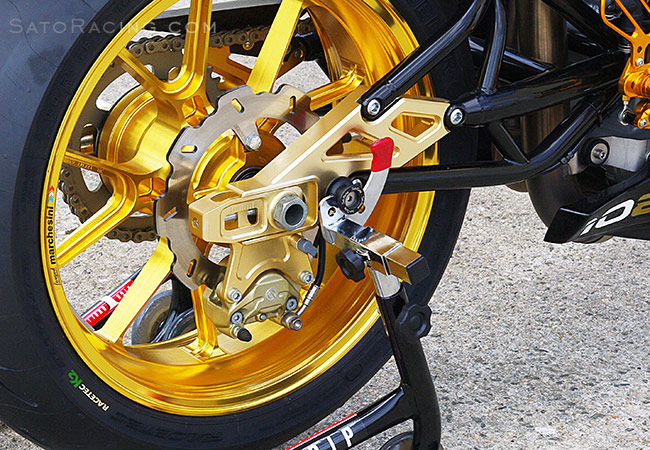 SATO RACING Swingarm Spools - 8mm - on a Bimota DB6